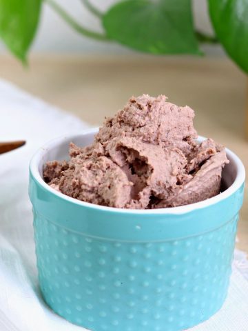 German Liverwurst in a teal ramekin.